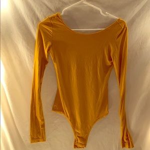 Yellow bodysuit